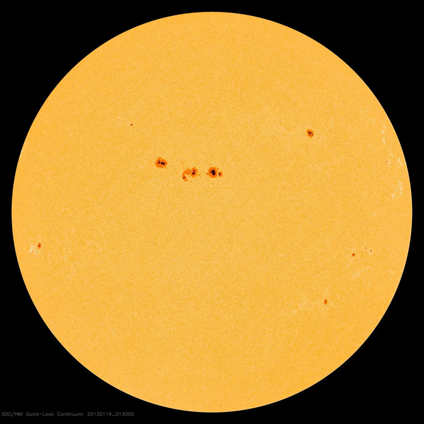 The Sun with a few dark sunspots