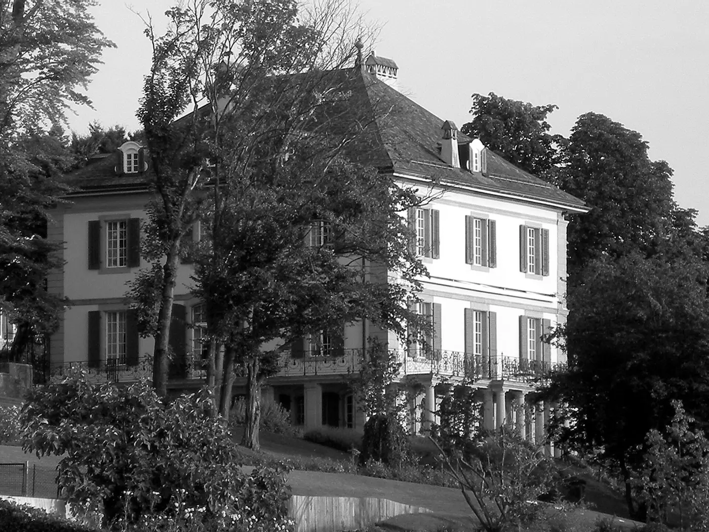 Villa Diodati on Lake Geneva among trees, black-and-white photo