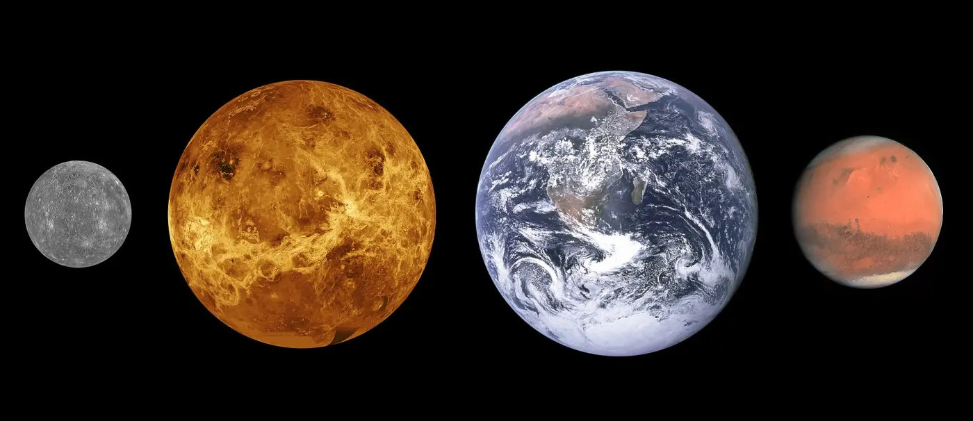 Mercury, Venus, Earth and Mars side by side for size comparison against a black background